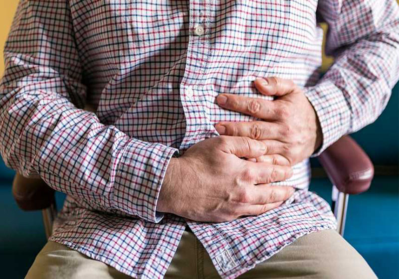 C:\Users\Fateme\Desktop\New folder (3)\1140-man-holding-stomach.jpg